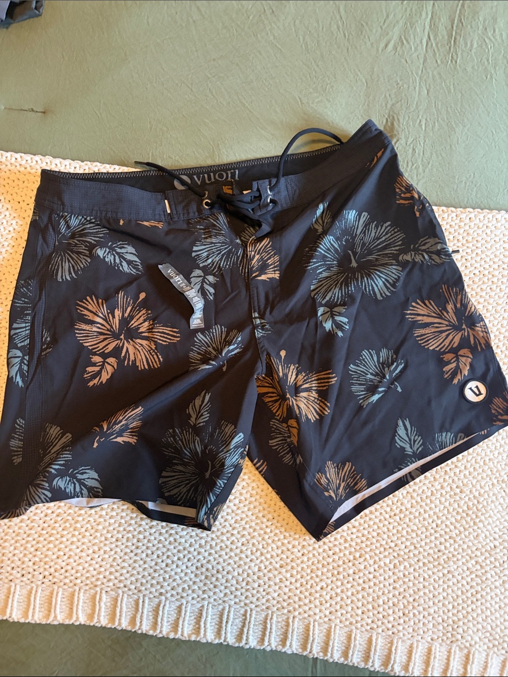 Vuori Black Swim Shorts with Tan & Teal Floral Print